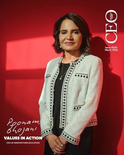 Woman with dark shoulder-length hair in white beaded cardigan over black top against red background with CEO magazine cover