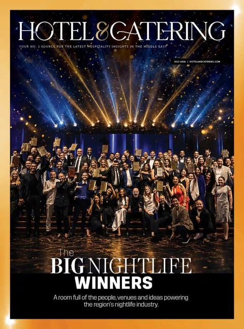 Hotel & Catering magazine cover featuring nightlife industry winners posing under dramatic blue and gold stage lighting