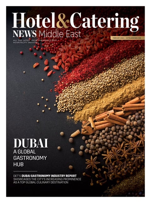 Hotel and Catering News Middle East magazine cover featuring spices and ingredients with Dubai gastronomy hub article